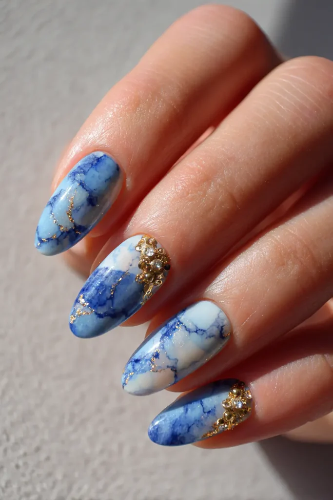 9 Summer to Fall Nails Ideas 7 Nail Blue Design with Gold Details